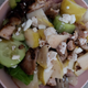 Dinner salad with chopped chicken, cucumber, pear, goat cheese and raspberry vinaigrette